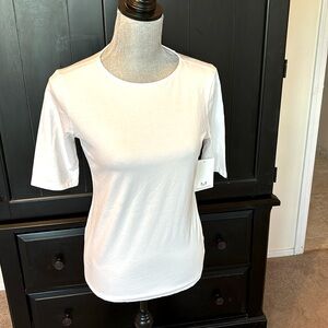 New with Tags! Magaschoni jersey top.Half sleeve. Great basic for your wardrobe!